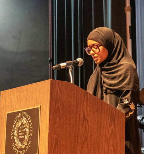 Woman speaking at a podium